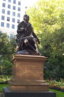 The statue of Robert Burns in Embankment Gardens, London.